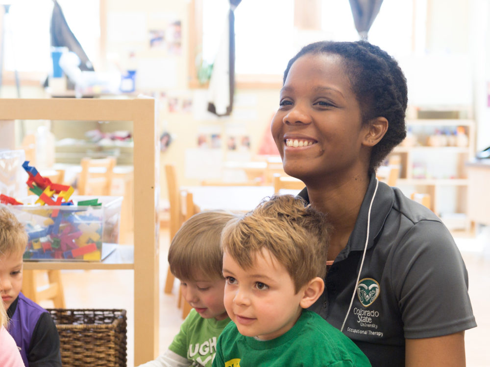 Human Development and Family Studies student with children at the Early Childhood Center