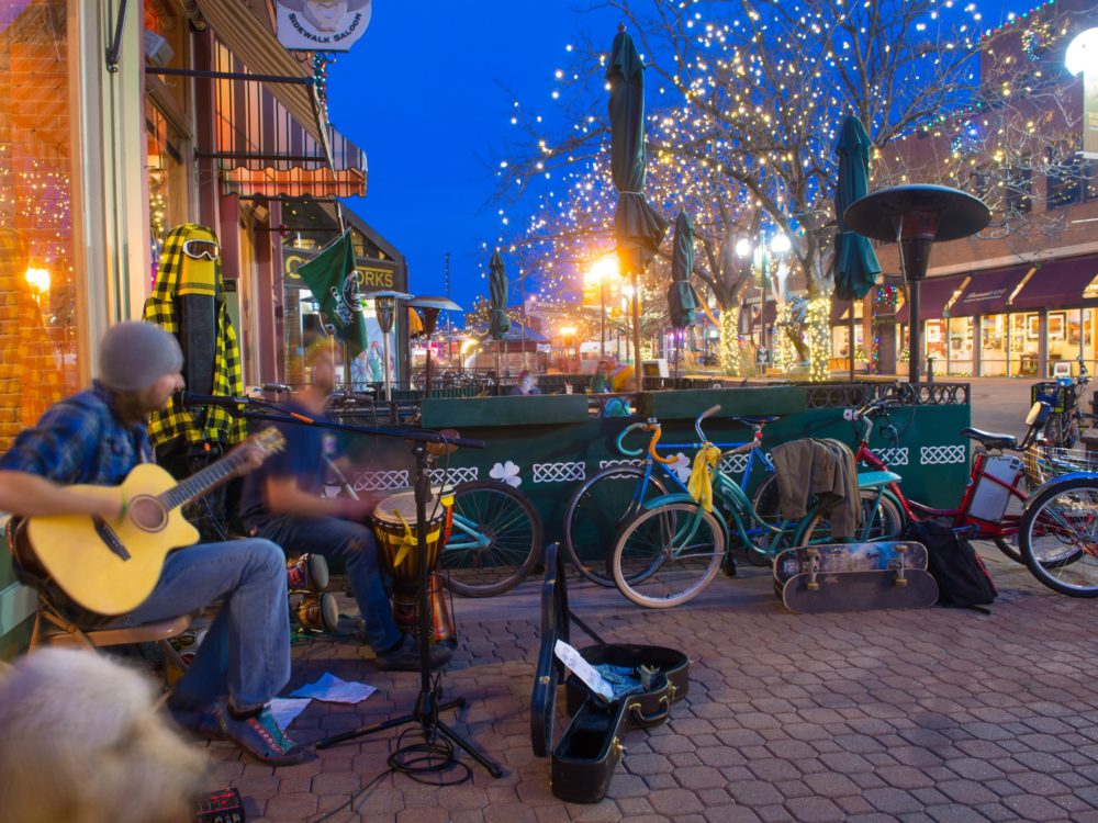 Playing guitar in Old Town Fort Collins