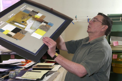 Craig looking at student work in a portfolio review