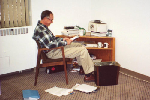 Grant Sherwood at his desk