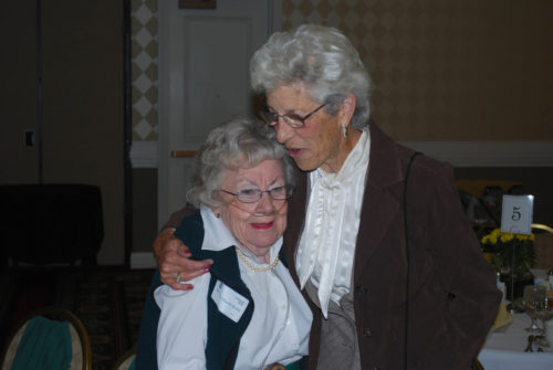 Marie Macy with a fellow alumna