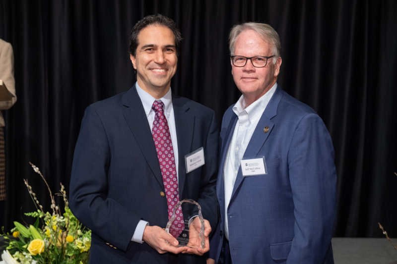 Mehmet Ozbekk, Construction Management, is presented with teh Superior Faculty Service award at the College of Health and Human Sciences 2019 All-College Awards Ceremony.
