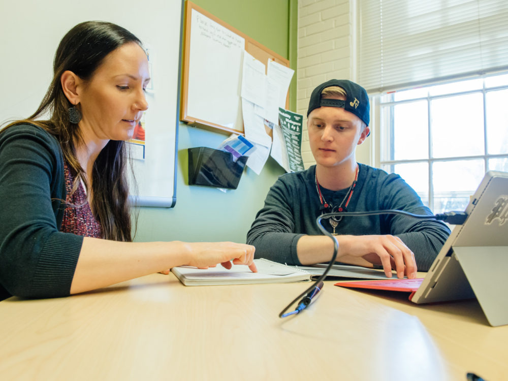 Assistive Technology Resource Center counselor with a student