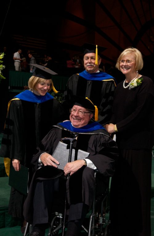 Nancy at commencement with Larry Grosse, Joe Phelps, and Lois Phelps