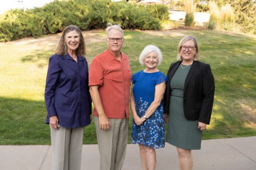 Nancy with the current dean and two former deans of the College of Health and Human Sciences outdoors