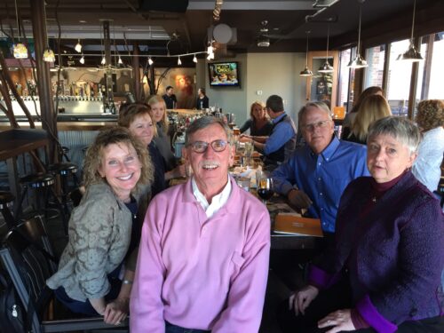 Jeff McCubbin with faculty and staff in a resturant
