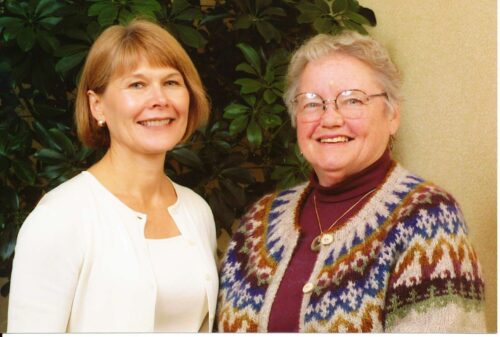 Jodie Hanzlik posing with Wanda Mayberry who is wearing a wool knit sweater
